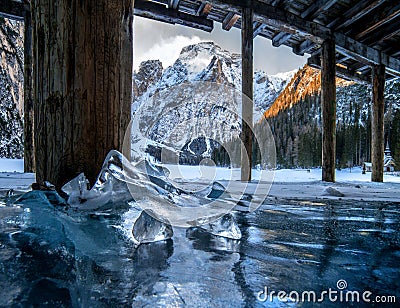 Amazing shot from frozen Pragser Wildsee lake and the snowy landscapes in South Tyrol, Italy Stock Photo