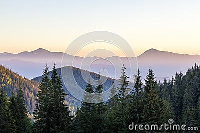 Amazing soft sunset in mountains. Cerpathian mountain peaks and Stock Photo