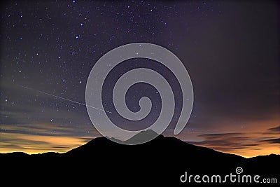 Amazing starry night accompany with meteor Stock Photo