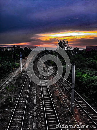 The amazing sunset and railroad Stock Photo