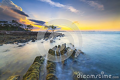 Amazing sunset at Tanjung Pinggir Beach Batam Island Stock Photo