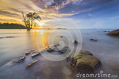 Amazing sunset at Tanjung Pinggir Beach Batam Island Stock Photo