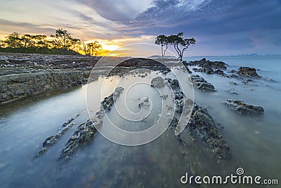 Amazing sunset at Tanjung Pinggir Beach Batam Island Stock Photo