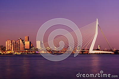 Amazing sunset view of Erasmus bridge and several skyscrapers in Rotterdam, Holland. Editorial Stock Photo