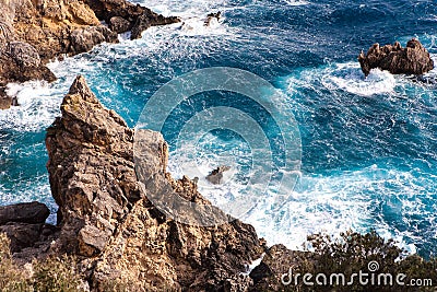 Amazing surging sea among cliffs at Paleokastritsa in Corfu Stock Photo
