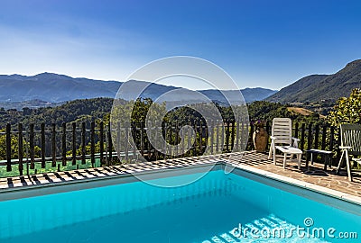 An amazing swimming pool in the mountains Stock Photo