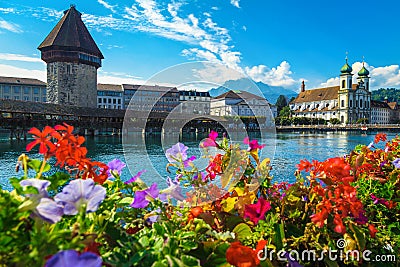 Flowery waterfront and Chapel bridge on the Reuss river Lucerne Stock Photo