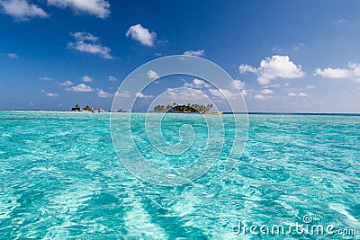 Amazing turquoise water and small island in the caribbean Stock Photo