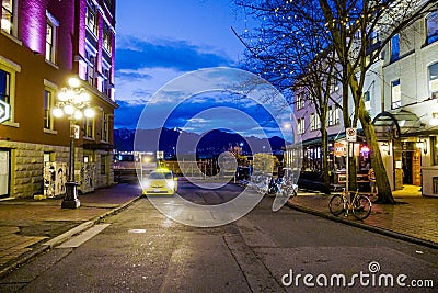 Amazing Vancouver Gastown district at night - the old town - VANCOUVER - CANADA - APRIL 12, 2017 Editorial Stock Photo