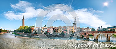 Amazing Verona cityscape view on the riverside with historical buildings and towers Stock Photo