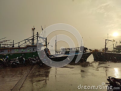 Amazing view of boats parked at N4 beach during a rainy day Editorial Stock Photo