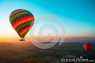 Amazing view of a bright vibrant baloon at sunrise. Balloon rides in luxor, view of egypt. Famous in cappadoccia as well, thrill Stock Photo