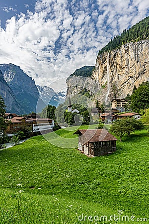 Amazing view of famous Lauterbrunnen town with beautiful Staubbach waterfalls, Switzerland Stock Photo