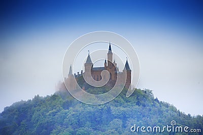 Amazing view of Hohenzollern castle in haze Stock Photo