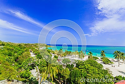 Amazing view of Holguin province tropical inviting beach and tranquil azure turquoise ocean on blue sky background Stock Photo