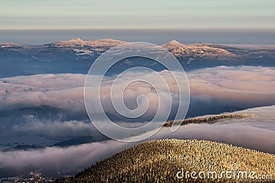 Amazing view from Jested mountain peak . Typical snowy morning, Czech republic. Stock Photo