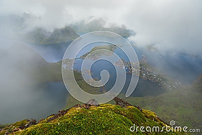 Amazing view of Lofoten islands in the fog, Norway Stock Photo