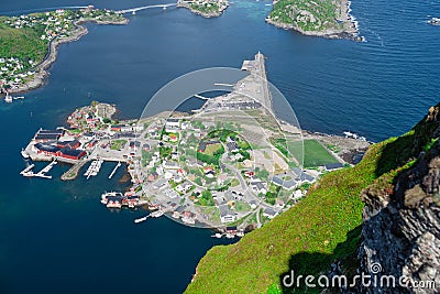 Amazing view from Reinebringen view point. Mountains and blue sea at Lofoten islands. Scenery of Reine fishing village Stock Photo