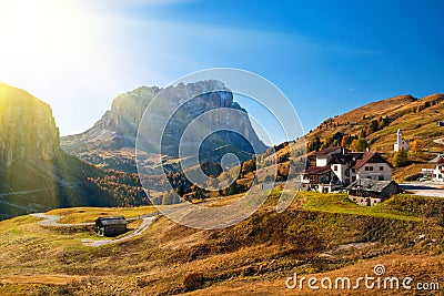 Amazing autumn view on Sassolungo mountain and Gardena Pass. Dolomite Alps, South Tyrol, Italy. Stock Photo