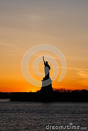 Amazing vertical view of the Statue of Liberty, at sunset Stock Photo