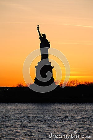 Statue of Liberty, at sunset Editorial Stock Photo