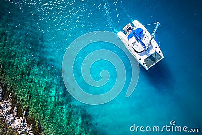 Amazing view to Yacht sailing in open sea at windy day. Drone view - birds eye angle Stock Photo