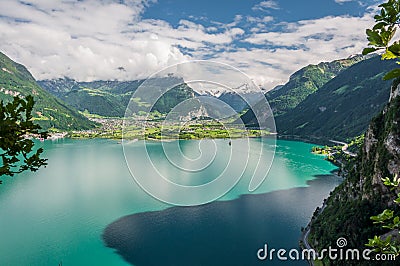 Tourquise lake, roads and Swiss Alps in Switzerland Stock Photo