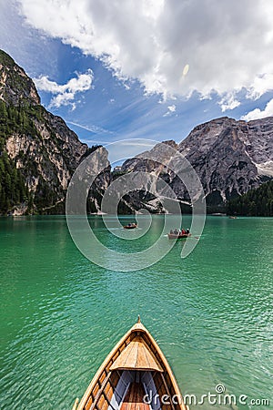 Amazing view of turquoise Lago di Braies Lake or Pragser Wildsee in Dolomite mountains, Italy Editorial Stock Photo