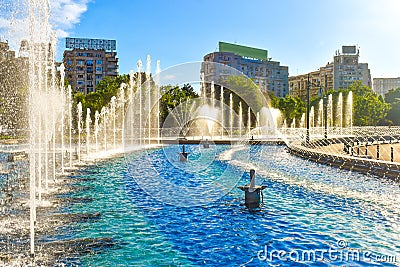 Amazing water fountains in the Downtown of Bucharest City in the Union`s Square or Piata unirii Stock Photo