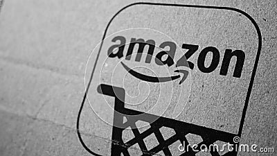 Amazon box detail with logo, smile and stylized shopping cart in black and white Editorial Stock Photo