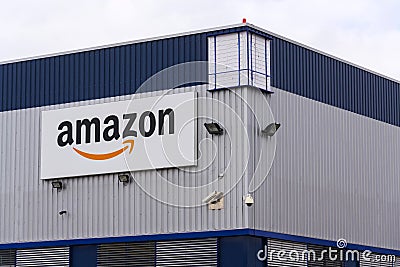 Amazon electronic commerce company logo on logistics building on March 12, 2017 in Dobroviz, Czech republic Editorial Stock Photo