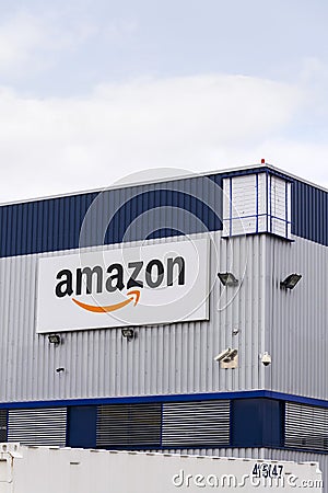 Amazon electronic commerce company logo on logistics building on March 12, 2017 in Dobroviz, Czech republic Editorial Stock Photo