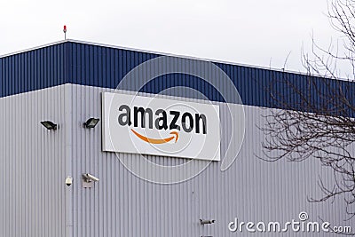 Amazon electronic commerce company logo on logistics building on March 12, 2017 in Dobroviz, Czech republic Editorial Stock Photo