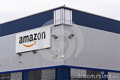 Amazon electronic commerce company logo on logistics building on March 12, 2017 in Dobroviz, Czech republic Editorial Stock Photo