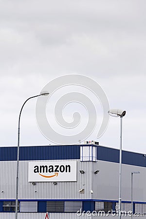 Amazon electronic commerce company logo on logistics building on March 12, 2017 in Dobroviz, Czech republic Editorial Stock Photo