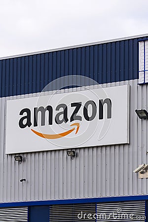 Amazon electronic commerce company logo on logistics building on March 12, 2017 in Dobroviz, Czech republic Editorial Stock Photo