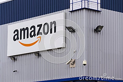 Amazon electronic commerce company logo on logistics building on March 12, 2017 in Dobroviz, Czech republic Editorial Stock Photo