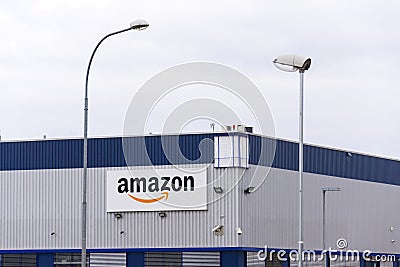 Amazon electronic commerce company logo on logistics building on March 12, 2017 in Dobroviz, Czech republic Editorial Stock Photo