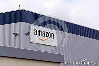 Amazon electronic commerce company logo on logistics building on March 12, 2017 in Dobroviz, Czech republic Editorial Stock Photo