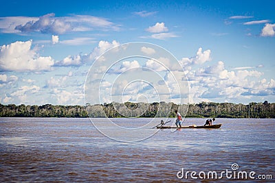 Amazon river boat with blue sky and clouds Stock Photo