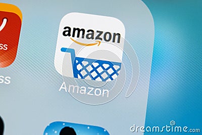 Amazon shopping application icon on Apple iPhone X screen close-up. Amazon shopping app icon. Amazon mobile application. Social Editorial Stock Photo