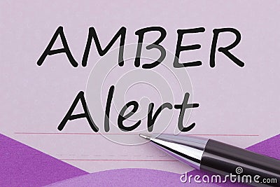 AMBER Alert written on note Stock Photo