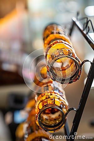 Amber bracelets on a special shelf Stock Photo