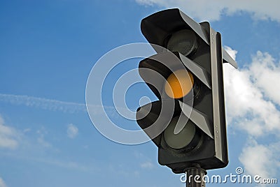 Amber color on the traffic light Stock Photo