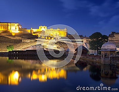 Amber Fort and Maota Lake at night. Stock Photo