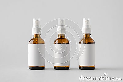 Amber Spray Bottle Mock-Up - Three Bottles. Blank Label Stock Photo