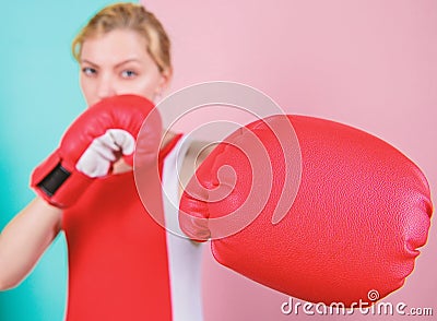 Ambitious girl fight boxing gloves. Female rights. I am gonna kick you off. Confident in her boxing skill. Boxing Stock Photo