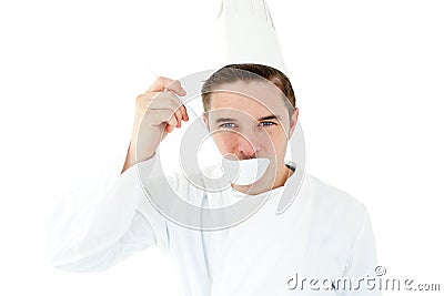 Ambitious male cook tasting a soup Stock Photo