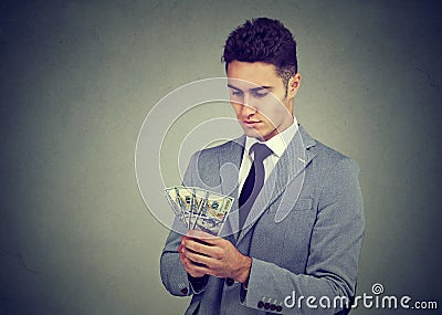 Ambitious young business man with money Stock Photo
