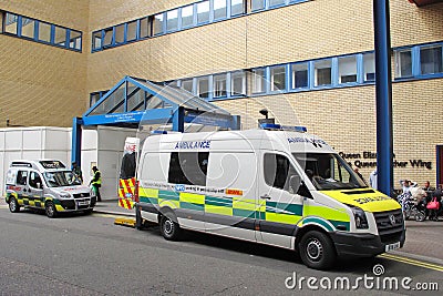 Ambulance cars in entrance of hospital Editorial Stock Photo